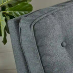 Fauteuil inclinable en tissu capitonné
