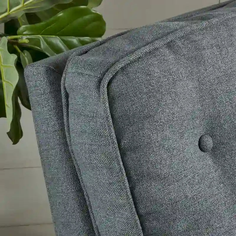 Fauteuil inclinable en tissu capitonné