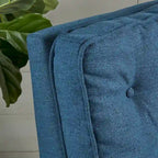 Fauteuil inclinable en tissu capitonné