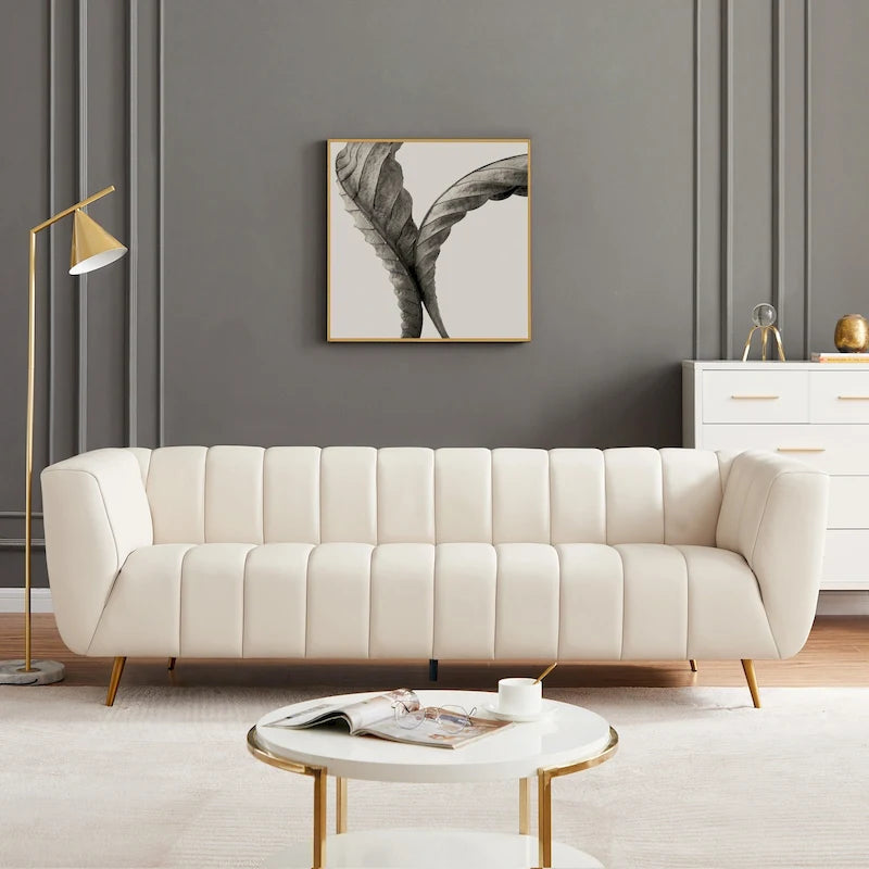 Canapé en cuir pleine fleur capitonné de style Mid-Century Modern, couleur crème