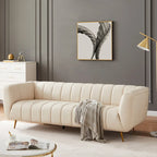 Canapé en cuir pleine fleur capitonné de style Mid-Century Modern, couleur crème