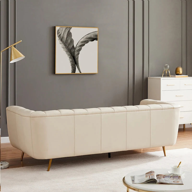 Canapé en cuir pleine fleur capitonné de style Mid-Century Modern, couleur crème