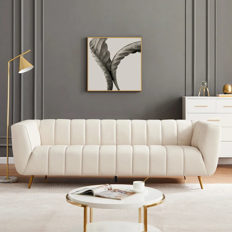 Canapé en cuir pleine fleur capitonné de style Mid-Century Modern, couleur crème